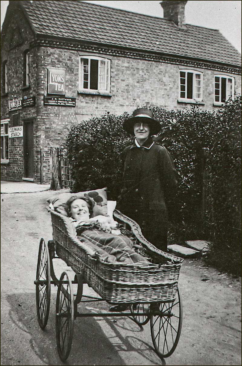 Mrs Edith Allen and daughter on Church Street outside Eastwood's shop