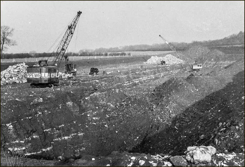 Open cast mining on the land between the Canal and Smalley's Farm. Taken from Nottingham Road. Hoe Hill in the background. (1960s approx)