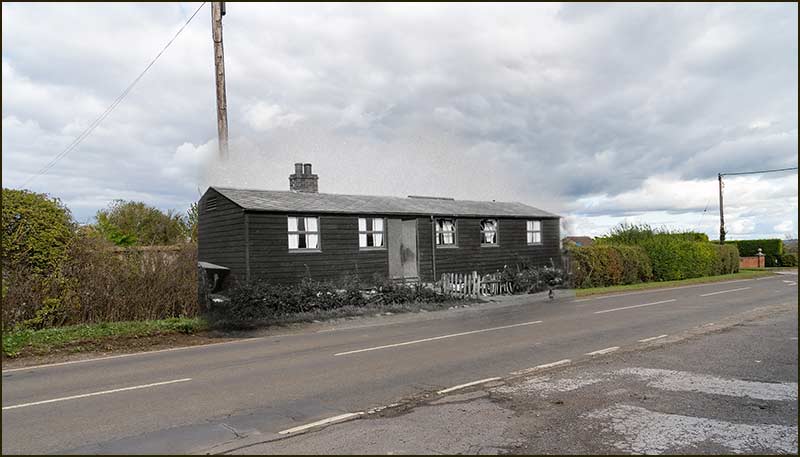 The black wooden bungalow